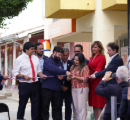 Inauguración nueva sucursal en Ránquil, con personas cortando la cinta